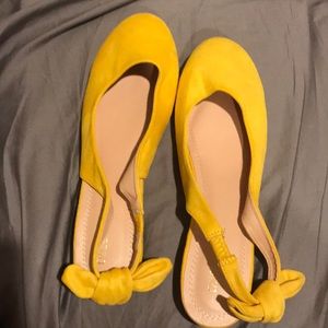 Yellow slip on shoes